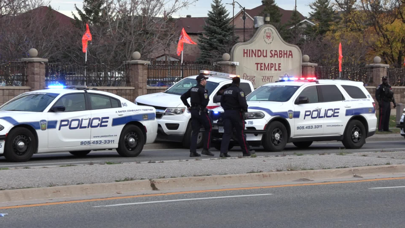 Peel Regional Police respond to a protest at a Brampton, Ont. Hindu temple that turned violent on Nov. 4, 2024. (CP24/Jacob Estrin)