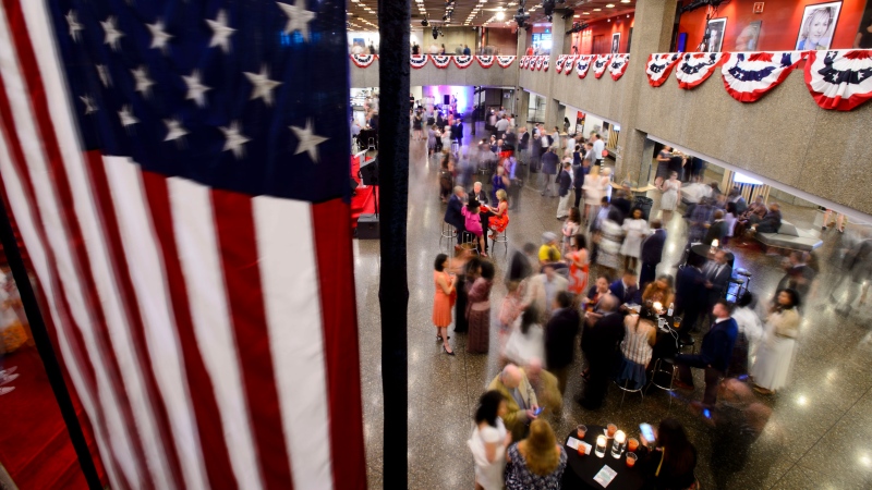 Guest take part in the U.S. Embassy's Cajun Bayou Country Fourth of July Celebrations at the National Arts Centre in Ottawa on Thursday, July 4, 2019. THE CANADIAN PRESS/Sean Kilpatrick
