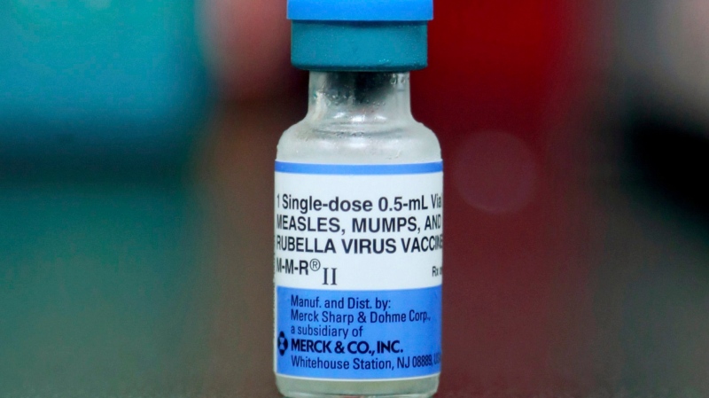 FILE - This Friday, May 17, 2019 file photo shows a vial of a measles, mumps and rubella vaccine in Mount Vernon, Ohio. On Thursday, Aug. 29, 2019. (AP Photo/Paul Vernon) 