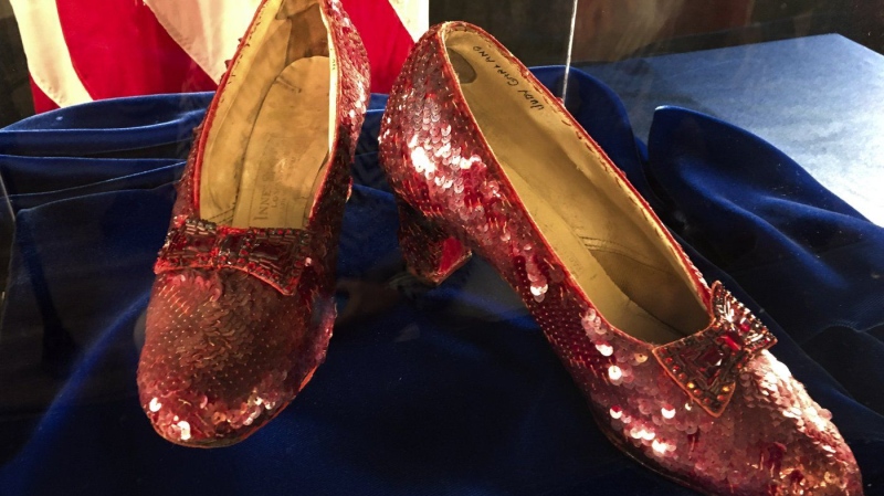 Ruby slippers once worn by Judy Garland in the "The Wizard of Oz," are displayed at a news conference, Sept. 4, 2018, at the FBI office in Brooklyn Center, Minn. (Jeff Baenen/AP Photo)