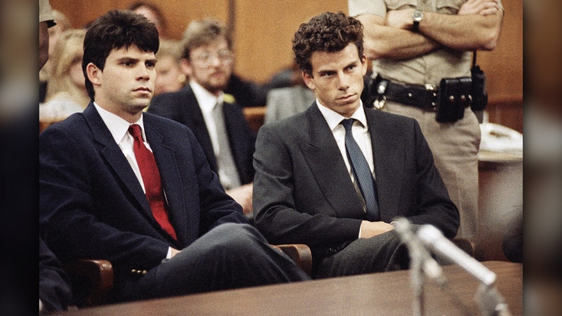 Lyle, left, and Erik Menendez sit in Beverly Hills Municipal Court where their attorneys delayed making pleas on behalf of the brothers who are charged for the 1990 murders of their millionaire parents. (Nick Ut/AP via CNN Newsource)