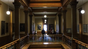 A person walks through Queen's Park in Toronto, Wednesday, May 15, 2024. THE CANADIAN PRESS/Cole Burston