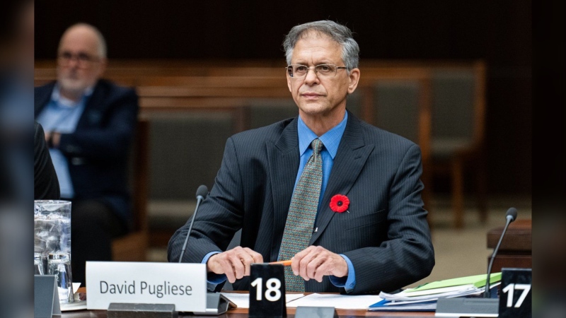 Ottawa Citizen/Sun journalist David Pugliese waits to appear as witness before the Standing Committee on Public Safety and National Security (SECU) investigating Russian Interference and Disinformation Campaigns in Canada in Ottawa, on Thursday, Nov. 7, 2024. THE CANADIAN PRESS/Spencer Colby