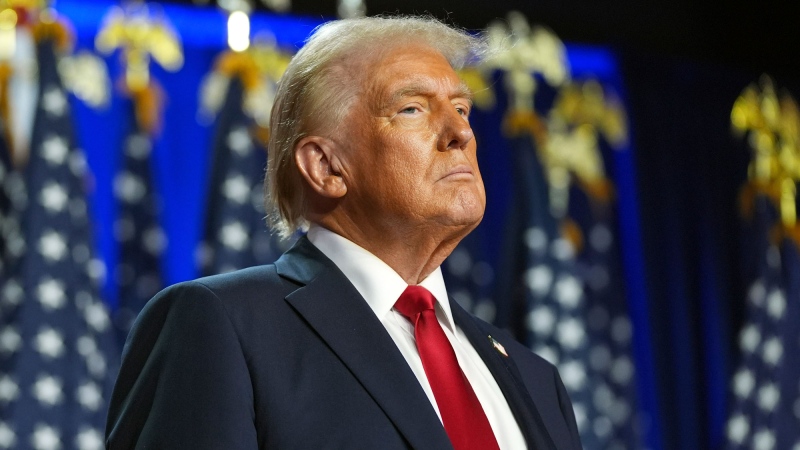 U.S. president-elect Donald Trump arrives at an election night watch party at the Palm Beach Convention Center, Wednesday, Nov. 6, 2024, in West Palm Beach, Fla. (AP Photo/Evan Vucci)