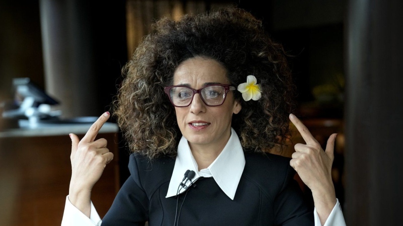 Masih Alinejad, 48, a prominent Iranian American human rights activist attends an interview with the Associated Press in Berlin, Germany, Saturday, Nov. 9, 2024. (AP Photo/Ebrahim Noroozi)