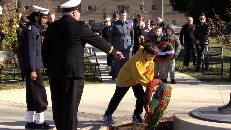 Jackson Winterhalt, 11, lays a wreath for Lord Nelson Public School at the memorial at Vimy Ridge Park in London, Ont. on Nov. 9, 2024. (Brent Lale/CTV News London) 