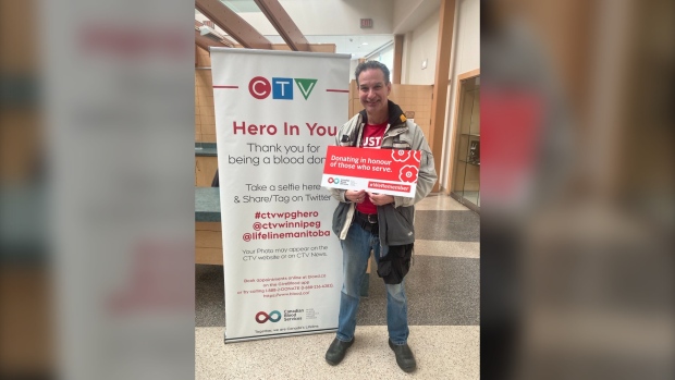 Tim Webster poses for a photo after donating blood during the Hero In You campaign. (X:@websterman70)