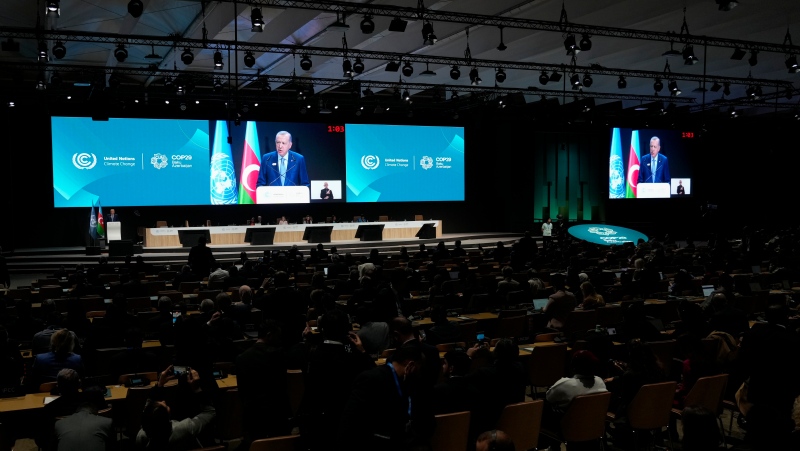 Turkiye President Recep Tayyip Erdogan speaks during a plenary session at the COP29 UN Climate Summit, Tuesday, Nov. 12, 2024, in Baku, Azerbaijan. (AP Photo/Rafiq Maqbool)
