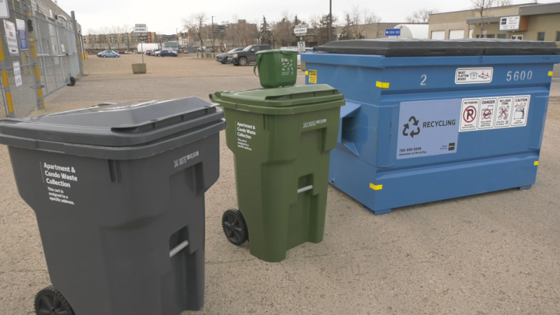 Garbage, food scraps and recycling bins can be seen outside an Edmonton condominium on Nov. 7, 2024. (CTV News Edmonton)