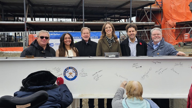 A beam-topping ceremony, a construction tradition, was held Thursday to celebrate the completion of the structural phase of the project, when the final beam of the main structure is put in place. (Supplied)