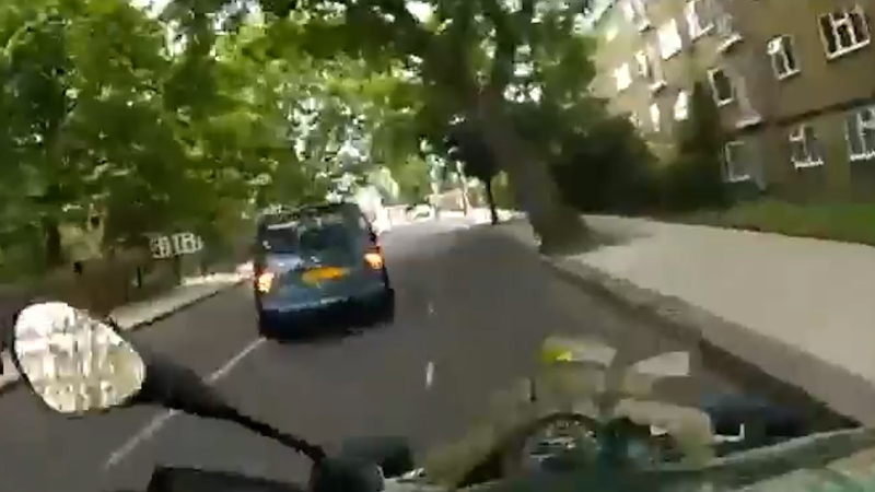 Suspect knocks officer in U.K. off motorcycle