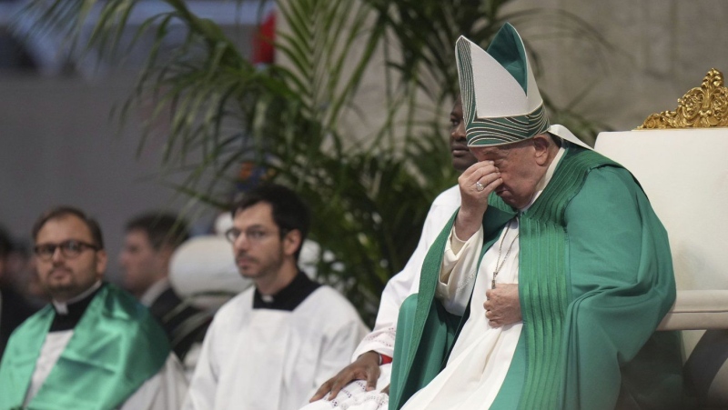 Pope Francis presides over a mass on the occasion of the World Day of the Poor in St. Peter's Basilica, at the Vatican, Sunday, Nov. 17, 2024. (AP Photo/Alessandra Tarantino)