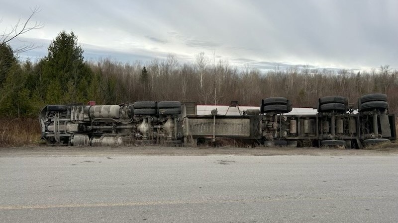 A gravel truck rolled onto its side on Mara Cardon Boundary Road in the City of Kawartha Lakes, Ont., on Tues., Nov. 19, 2024. (Source: OPP)