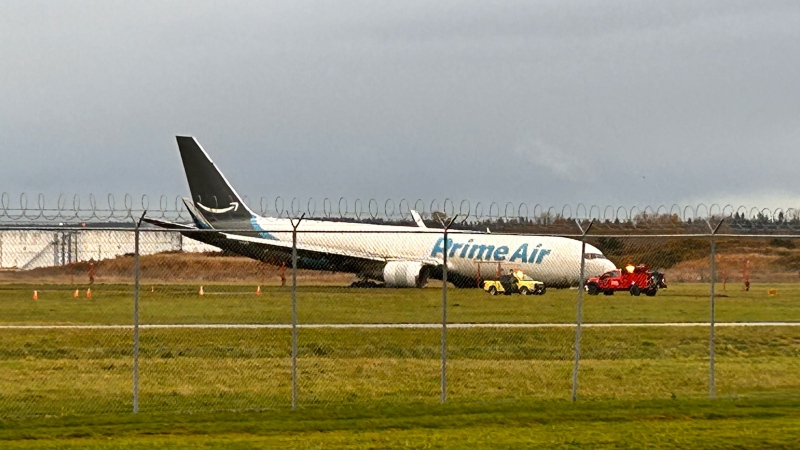 A Boeing 767 operated by Cargojet Airways is seen after it ran off the runway at Vancouver International Airport in B.C., on Tuesday, Nov. 19, 2024. (Jim Fong / CTV Vancouver)