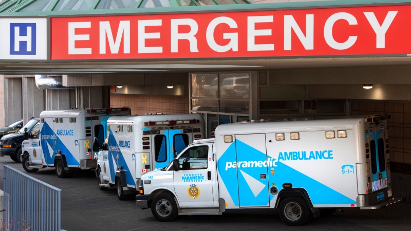 A paramedic closes the doors on his ambulance at a hospital in Toronto on Tuesday, April 6, 2021. THE CANADIAN PRESS/Frank Gunn
