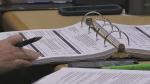 A binder of the proposed annual budget sits on a table at city hall, November 20, 2024 (Daryl Newcombe/CTV News London)