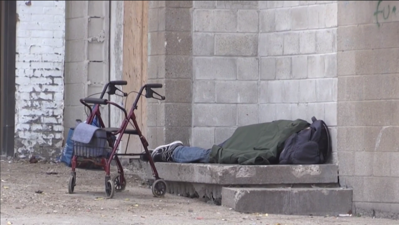 An unhoused person sleeps on a doorstep in this undated file photo (Daryl Newcombe/CTV News London)