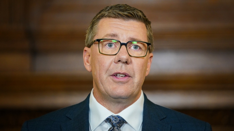 Saskatchewan Party Leader Scott Moe speaks to the media during a scrum after a televised leaders' debate in Regina, on Wednesday, October 16, 2024. THE CANADIAN PRESS/Heywood Yu