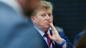 Tom Clark, Consul General of Canada in New York, United States, listens in as Prime Minister Justin Trudeau talks to the media in Philadelphia on Tuesday, May 21, 2024. THE CANADIAN PRESS/Sean Kilpatrick