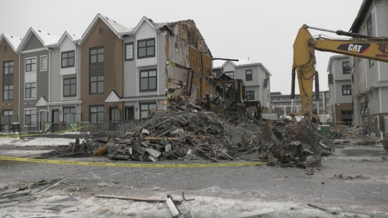 Investigators are working to piece together what caused an explosion and fire at a six-plex in the southeast Calgary community of Mahogany.