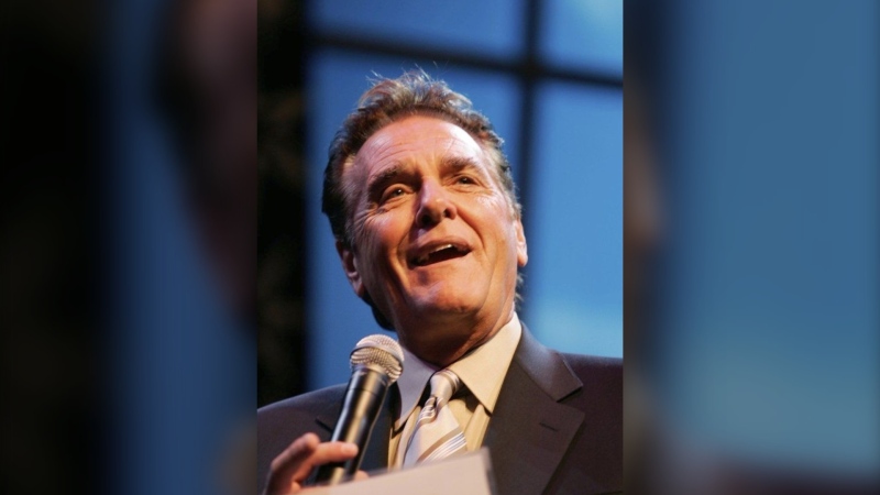 Chuck Woolery hosts a special premiere of the '$250,000 Game Show Spectacular' at the Las Vegas Hilton Saturday, Oct. 13, 2007, in Las Vegas. (Ronda Churchill/Las Vegas Review-Journal via AP, File)