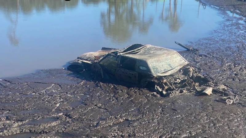 Vehicle and remains recovered from pond