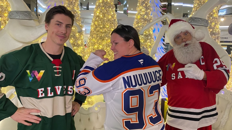 Edmonton Oilers star Ryan Nugent-Hopkins joined Santa Claus and a slew of fans at West Edmonton Mall on Nov. 26, 2024, for a charitable photo-op that raised $5,000 in support of the Ben Stelter Foundation. (Matt Marshall/CTV News Edmonton)