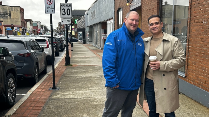 Nova Scotia Liberal Leader Zach Churchill (right) and PC candidate Nick Hilton (left) are seen together in Yarmouth on Nov. 27, 2024. (CTV/Jonathan MacInnis) 