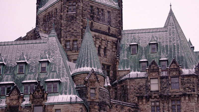 Snow dusts the rooftops of the Confederation Building in Ottawa. (Getty)