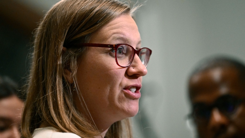 Leader of the Government in the House of Commons Karina Gould takes questions from reporters before a meeting of the Liberal caucus on Parliament Hill in Ottawa on Wednesday, Oct. 9, 2024. THE CANADIAN PRESS/Justin Tang