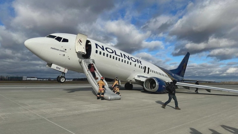 A Boeing 737 has its front wheels up in the air after an emergency landing at Montreal's Mirabel airport on Wednesday, Nov. 27, 2024. (Courtesy/Noovo Info)