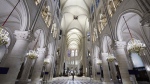 The nave of Notre-Dame de Paris cathedral is seen while French President Emmanuel Macron visits the restored interiors of the cathedral, Friday Nov. 29, 2024, in Paris. (Stephane de Sakutin, Pool via AP)