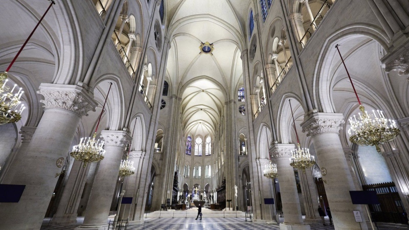 The nave of Notre-Dame de Paris cathedral is seen while French President Emmanuel Macron visits the restored interiors of the cathedral, Friday Nov. 29, 2024, in Paris. (Stephane de Sakutin, Pool via AP)