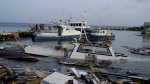 Boats damaged by Hurricane Beryl wade in the water at the Bridgetown Fisheries, Barbados, July 2, 2024. (AP Photo/Ricardo Mazalan, File)
