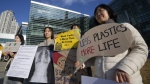 South Korean environment activists protest  in Busan, South Korea, Sunday, Dec. 1, 2024. (AP Photo/Ahn Young-joon)