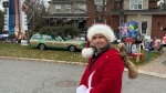 Shawn Turcotte stands in front of his home decorated in the spirit of Christmas movies. (Kimberley Johnson/CTV News Ottawa)