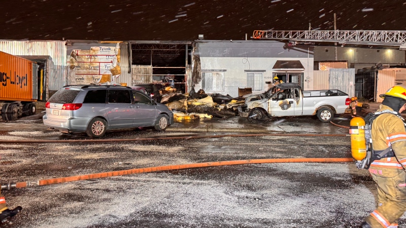 Five vehicles were set aflame in a suspected criminal fire in Montreal's Saint-Leonard borough. (Cosmo Santamaria/CTV News)