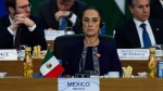 Mexico's President Claudia Sheinbaum and other G20 leaders attend the G20 Summit at the Museum of Modern Art in Rio de Janeiro on Nov. 18, 2024. (Eric Lee / The Canadian Press / AP-pool) 
