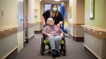 Sheri Levergood spends time with her mother, Janet Levergood at a long-term care residence where Janet now lives in Waterloo, Ont. on Tuesday, April 4, 2023. (THE CANADIAN PRESS//Peter Power)