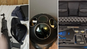 Restricted weapons and military grade technology pictured on Wen's cell phone and seized from his home. (U.S. Department of Justice via CNN Newsource)