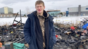 TJ Bedggood, who lives in the encampment at Energy Court, said he didn’t think twice about saving his friend from a burning tent which was sparked by an exploding propane tank. (Alana Everson/CTV News) 