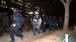 South Korean martial law soldiers leave the National Assembly in Seoul, South Korea, Wednesday, Dec. 4, 2024. (The Canadian Press/AP-Yonhap, Kim Ju-sung)