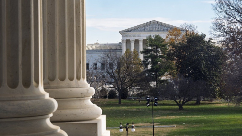 The U.S. Supreme Court is framed by the columns of the Capitol in Washington, Tuesday, Dec. 3, 2024. T (AP Photo/J. Scott Applewhite)
