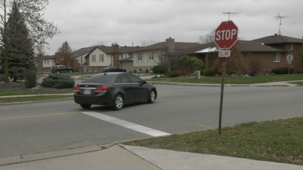 A driver speeds through a stop sign at a three-way intersection near Heritage Park in LaSalle, Ont. on Dec. 4, 2024. (Sanjay Maru/CTV News Windsor)