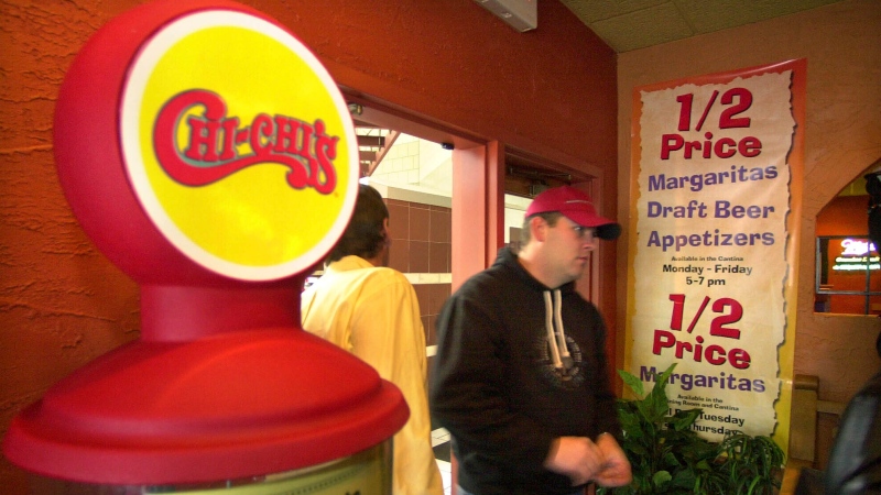 An unidentified man arrives at the Chi-Chi's Mexican Restaurant in the Beaver Valley Mall on Jan. 15, 2004, in Monaca, Pa. (AP Photo/Gene J. Puskar, File)