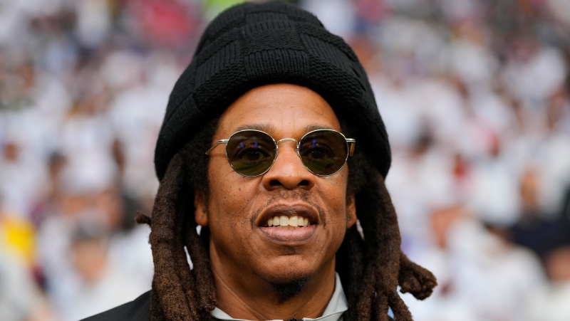 Jay-Z smiles ahead of the Champions League final soccer match between Borussia Dortmund and Real Madrid at Wembley stadium in London, Saturday, June 1, 2024. (Kirsty Wigglesworth/AP Photo)