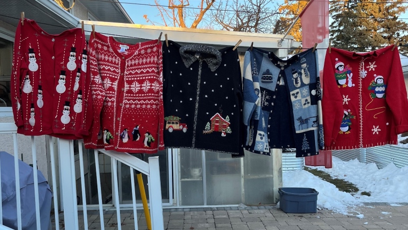 Melissa Hartwell says she was happy to hang her Christmas sweaters with care outside on a beautiful December day!