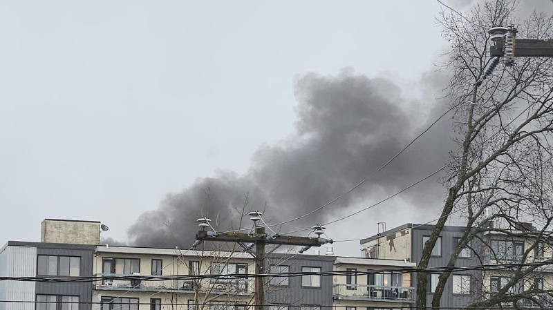 A seven-storey apartment building was evacuated on Dec. 11, 2024 after a fire broke out. (Cosmo Santamaria / CTV News)