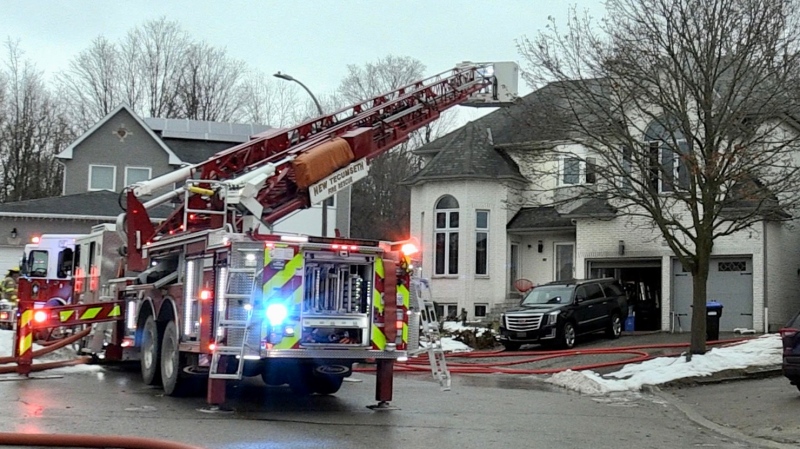 Firefighters attend a home on Previn Court in Alliston, Ont. on Mon., Dec. 16, 2024, after a fire broke out. (CTV News/Steve Mansbridge) 