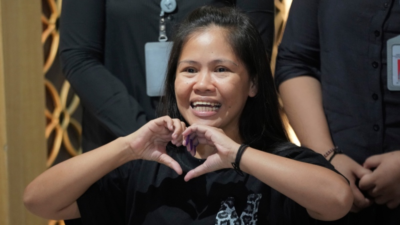 Mary Jane Veloso, a Filipina who was on death row in Indonesia, attends a press conference prior to her repatriation to the Philippines at Soekarno-Hatta International Airport in Indonesia on Dec. 17, 2024. (Tatan Syuflana / AP Photo)